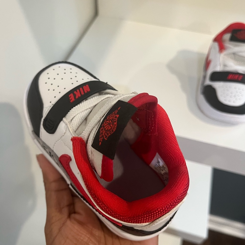 Jordan Kids Black, White, and Red Sneakers